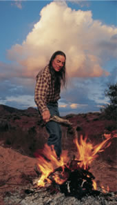 Photo of Thom Alcoze with fire